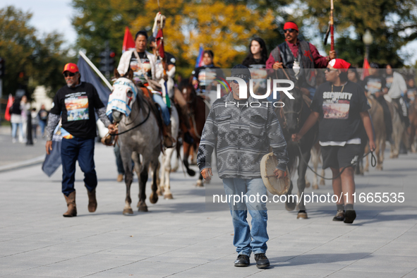 Members of the Muwekma Ohlone Tribe of the San Francisco Bay Area, along with other tribal groups and their supporters, arrive at the Lincol...