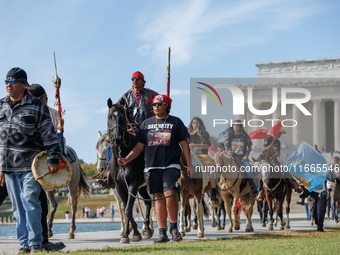 Members of the Muwekma Ohlone Tribe of the San Francisco Bay Area, along with other tribal groups and their supporters, arrive at the Lincol...