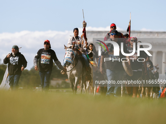 Members of the Muwekma Ohlone Tribe of the San Francisco Bay Area, along with other tribal groups and their supporters, arrive in Washington...