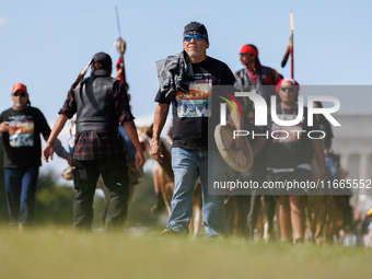 Members of the Muwekma Ohlone Tribe of the San Francisco Bay Area, along with other tribal groups and their supporters, arrive in Washington...