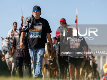 Members of the Muwekma Ohlone Tribe of the San Francisco Bay Area, along with other tribal groups and their supporters, arrive in Washington...