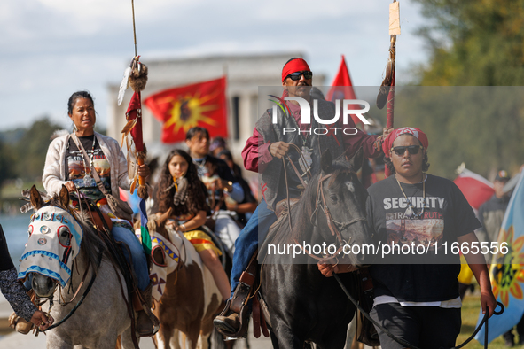 Members of the Muwekma Ohlone Tribe of the San Francisco Bay Area, along with other tribal groups and their supporters, arrive in Washington...