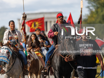 Members of the Muwekma Ohlone Tribe of the San Francisco Bay Area, along with other tribal groups and their supporters, arrive in Washington...