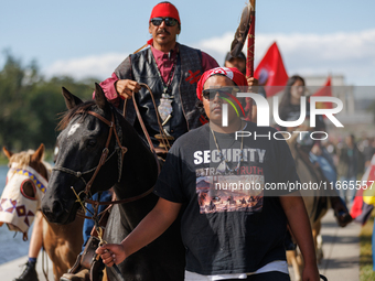 Members of the Muwekma Ohlone Tribe of the San Francisco Bay Area, along with other tribal groups and their supporters, arrive in Washington...