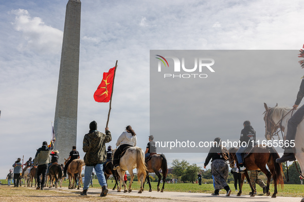 Members of the Muwekma Ohlone Tribe of the San Francisco Bay Area, along with other tribal groups and their supporters, arrive in Washington...