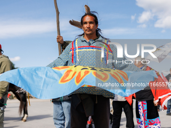 Members of the Muwekma Ohlone Tribe of the San Francisco Bay Area, along with other tribal groups and their supporters, arrive at the Lincol...