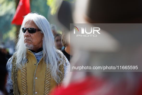 Members of the Muwekma Ohlone Tribe of the San Francisco Bay Area, along with other tribal groups and their supporters, arrive on horseback...