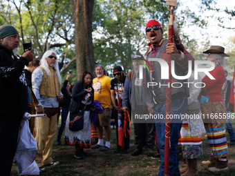 Members of the Muwekma Ohlone Tribe of the San Francisco Bay Area, along with other tribal groups and their supporters, arrive on horseback...