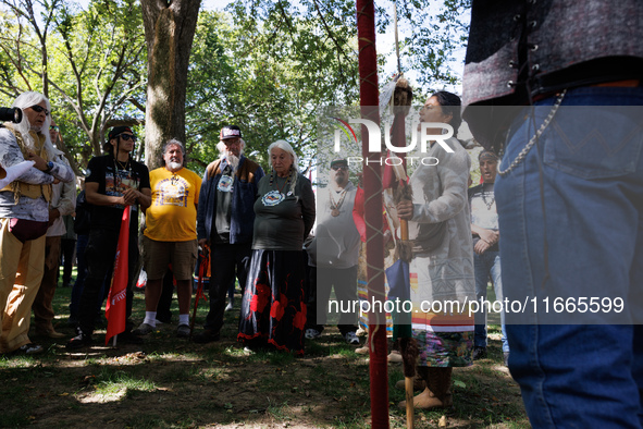 A woman speaks as members of the Muwekma Ohlone Tribe of the San Francisco Bay Area, along with other tribal groups and their supporters, ar...