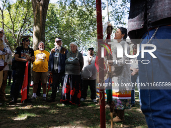 A woman speaks as members of the Muwekma Ohlone Tribe of the San Francisco Bay Area, along with other tribal groups and their supporters, ar...