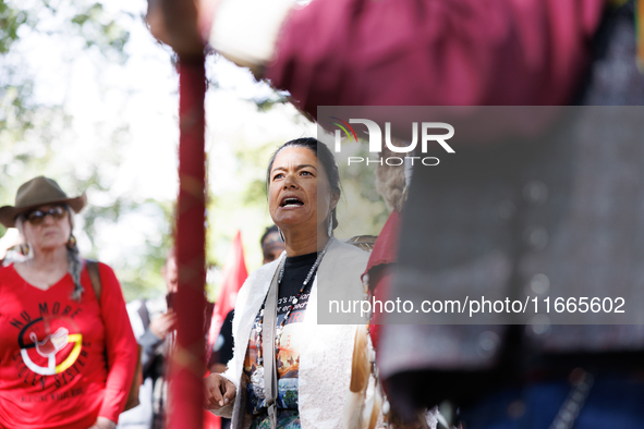 A woman speaks as members of the Muwekma Ohlone Tribe of the San Francisco Bay Area, along with other tribal groups and their supporters, ar...