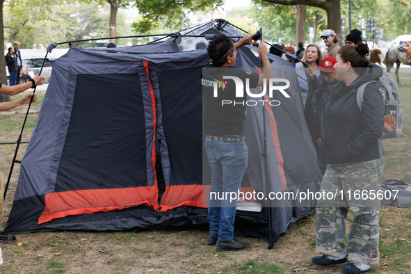 Members of the Muwekma Ohlone Tribe of the San Francisco Bay Area, along with other tribal groups and their supporters, set up an encampment...