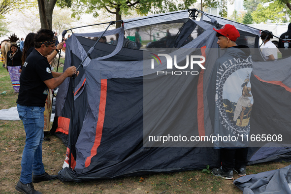 Members of the Muwekma Ohlone Tribe of the San Francisco Bay Area, along with other tribal groups and their supporters, set up an encampment...