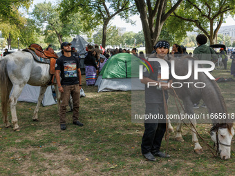 Members of the Muwekma Ohlone Tribe of the San Francisco Bay Area, along with other tribal groups and their supporters, set up an encampment...