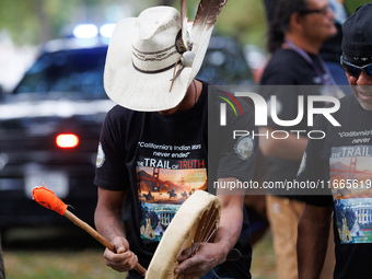 Members of the Muwekma Ohlone Tribe of the San Francisco Bay Area, along with other tribal groups and their supporters, arrive on horseback...