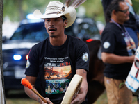 Members of the Muwekma Ohlone Tribe of the San Francisco Bay Area, along with other tribal groups and their supporters, arrive on horseback...