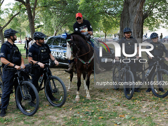 U.S. Capitol Police officers speak with members of the Muwekma Ohlone Tribe of the San Francisco Bay Area, after the group arrived on horseb...