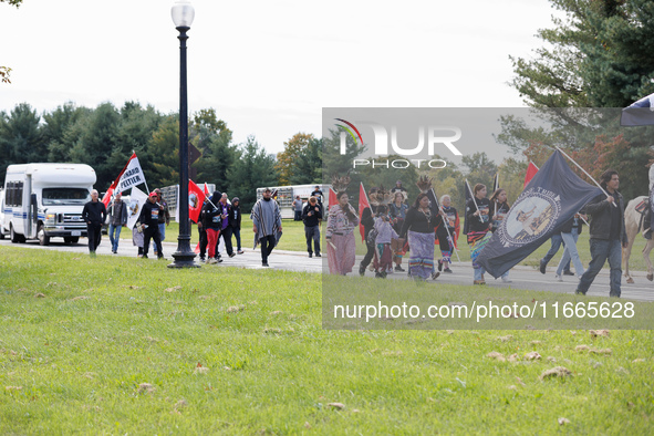 Members of the Muwekma Ohlone Tribe of the San Francisco Bay Area, along with other tribal groups and their supporters, arrive in Washington...