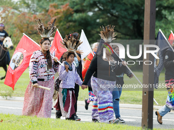 Members of the Muwekma Ohlone Tribe of the San Francisco Bay Area, along with other tribal groups and their supporters, arrive in Washington...