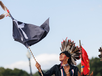 Members of the Muwekma Ohlone Tribe of the San Francisco Bay Area, along with other tribal groups and their supporters, cross the Arlington...