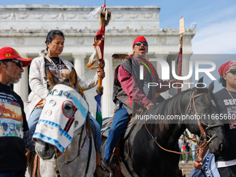 Members of the Muwekma Ohlone Tribe of the San Francisco Bay Area, along with other tribal groups and their supporters, arrive at the Lincol...