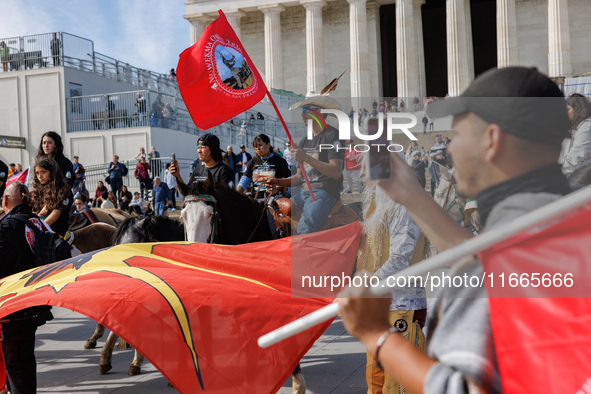 Members of the Muwekma Ohlone Tribe of the San Francisco Bay Area, along with other tribal groups and their supporters, arrive at the Lincol...