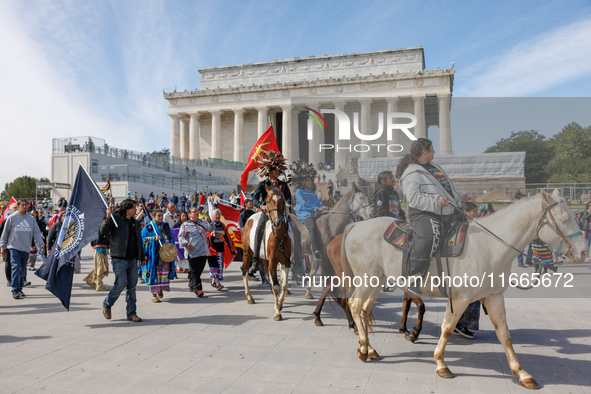 Members of the Muwekma Ohlone Tribe of the San Francisco Bay Area, along with other tribal groups and their supporters, arrive at the Lincol...