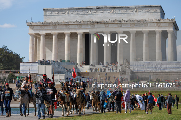 Members of the Muwekma Ohlone Tribe of the San Francisco Bay Area, along with other tribal groups and their supporters, arrive at the Lincol...