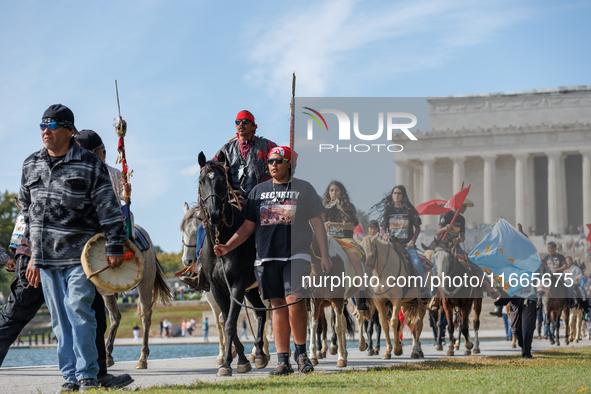 Members of the Muwekma Ohlone Tribe of the San Francisco Bay Area, along with other tribal groups and their supporters, arrive at the Lincol...