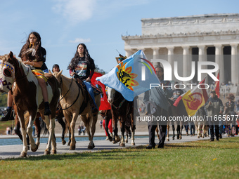 Members of the Muwekma Ohlone Tribe of the San Francisco Bay Area, along with other tribal groups and their supporters, arrive in Washington...