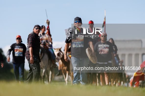 Members of the Muwekma Ohlone Tribe of the San Francisco Bay Area, along with other tribal groups and their supporters, arrive in Washington...