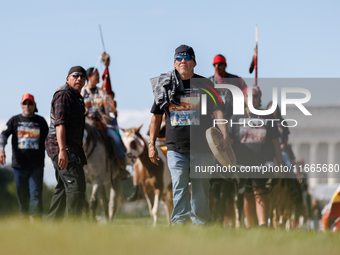 Members of the Muwekma Ohlone Tribe of the San Francisco Bay Area, along with other tribal groups and their supporters, arrive in Washington...