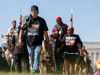 Members of the Muwekma Ohlone Tribe of the San Francisco Bay Area, along with other tribal groups and their supporters, arrive in Washington...