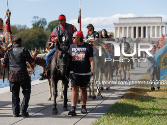 Members of the Muwekma Ohlone Tribe of the San Francisco Bay Area, along with other tribal groups and their supporters, arrive in Washington...