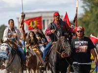 Members of the Muwekma Ohlone Tribe of the San Francisco Bay Area, along with other tribal groups and their supporters, arrive in Washington...