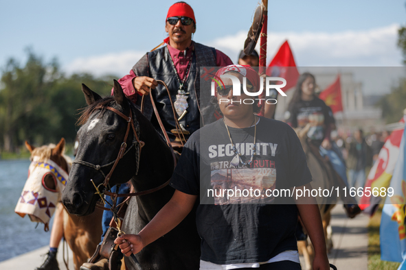 Members of the Muwekma Ohlone Tribe of the San Francisco Bay Area, along with other tribal groups and their supporters, arrive in Washington...