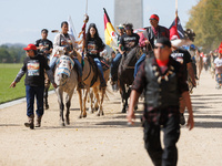 Members of the Muwekma Ohlone Tribe of the San Francisco Bay Area, along with other tribal groups and their supporters, march along the Nati...