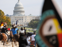 Members of the Muwekma Ohlone Tribe of the San Francisco Bay Area, along with other tribal groups and their supporters, march along the Nati...