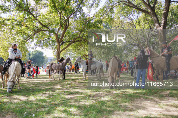 Members of the Muwekma Ohlone Tribe of the San Francisco Bay Area, along with other tribal groups and their supporters, arrive on horseback...