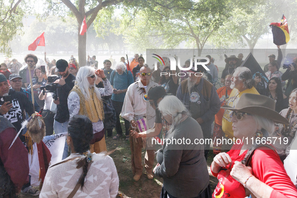 Members of the Muwekma Ohlone Tribe of the San Francisco Bay Area, along with other tribal groups and their supporters, arrive on horseback...