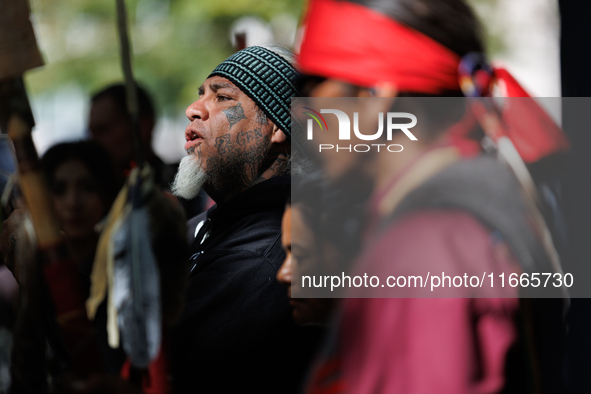 Members of the Muwekma Ohlone Tribe of the San Francisco Bay Area, along with other tribal groups and their supporters, arrive on horseback...