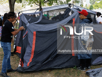 Members of the Muwekma Ohlone Tribe of the San Francisco Bay Area, along with other tribal groups and their supporters, set up an encampment...