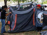 Members of the Muwekma Ohlone Tribe of the San Francisco Bay Area, along with other tribal groups and their supporters, set up an encampment...