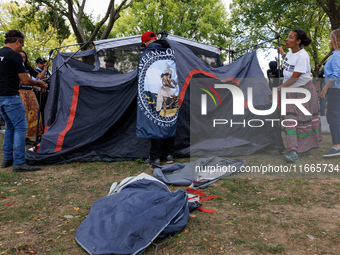 Members of the Muwekma Ohlone Tribe of the San Francisco Bay Area, along with other tribal groups and their supporters, set up an encampment...