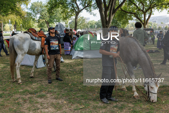 Members of the Muwekma Ohlone Tribe of the San Francisco Bay Area, along with other tribal groups and their supporters, set up an encampment...