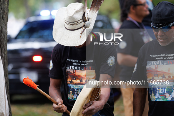 Members of the Muwekma Ohlone Tribe of the San Francisco Bay Area, along with other tribal groups and their supporters, arrive on horseback...