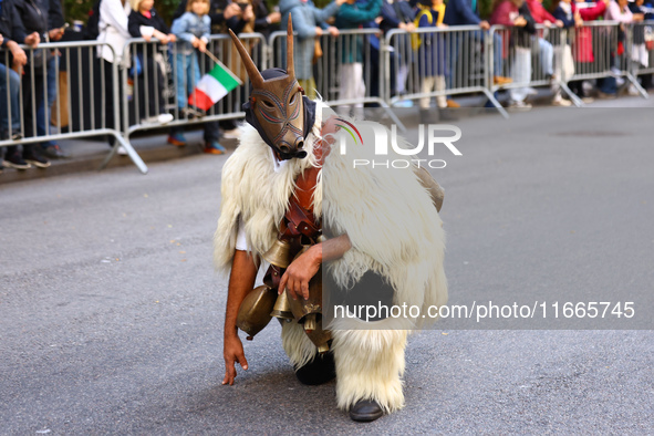 Performers in costume pose for a photo during the Columbus Day Parade in New York City, United States, on October 14, 2024. 