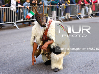 Performers in costume pose for a photo during the Columbus Day Parade in New York City, United States, on October 14, 2024. (