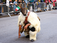 Performers in costume pose for a photo during the Columbus Day Parade in New York City, United States, on October 14, 2024. (