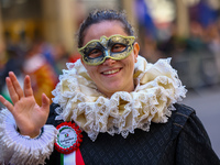 Performers in costume pose for a photo during the Columbus Day Parade in New York City, United States, on October 14, 2024. (